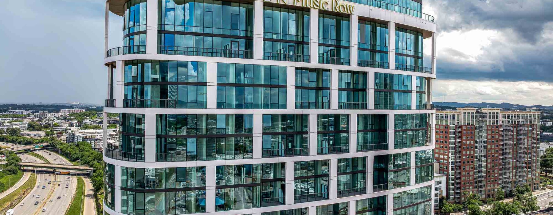 exterior of Albion Music Row high rise building