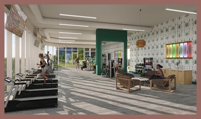 a group of people sitting in a room with chairs and tables
