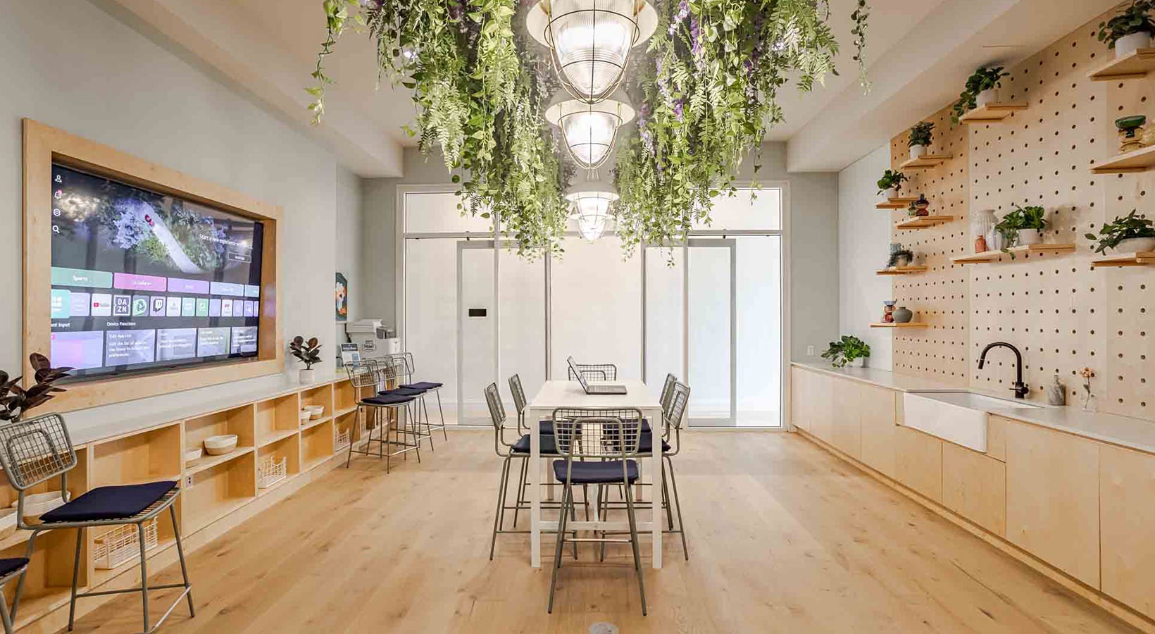 room with wood floors and a bookshelf