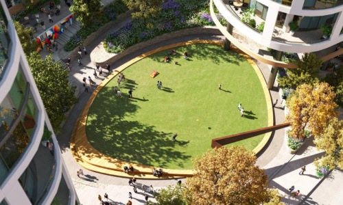 a large green park with people